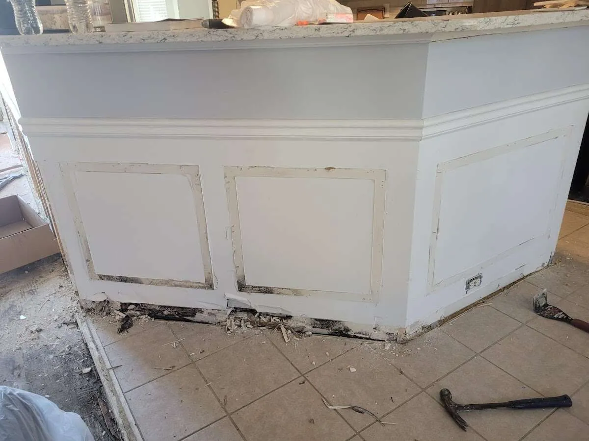 Water damage and mold on kitchen during Storm Damage Restoration in Smithfield